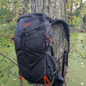 Mystery Ranch Black Backpack with Orange Accents